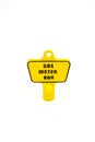 Yellow plastic meter key Royalty Free Stock Photo