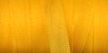 Yellow plastic nylon netting material as abstract background