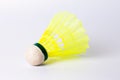 Yellow plastic shuttlecock on wite background Royalty Free Stock Photo