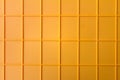 yellow plastic tile background, closeup of photo, elevated top view Royalty Free Stock Photo