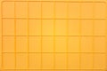 yellow plastic tile background, closeup of photo, elevated top view Royalty Free Stock Photo