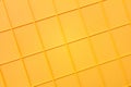 yellow plastic tile background, closeup of photo, elevated top view Royalty Free Stock Photo