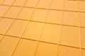 yellow plastic tile background, closeup of photo, elevated top view Royalty Free Stock Photo