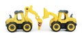 yellow plastic toy of tractor drill and bulldozer or loader isolated on white background. heavy construction vehicle. Royalty Free Stock Photo