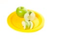 A yellow plate with apples Royalty Free Stock Photo