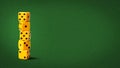 Yellow playing dice, with random numbers, on a green poker table. Copy space. Gambling, poker, board games Royalty Free Stock Photo