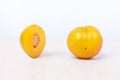 Yellow plum fruit on the white background Royalty Free Stock Photo