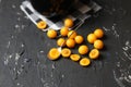 Yellow plums on the black background. Ingredients for a jam. Food photography. Autumn Concept, Royalty Free Stock Photo