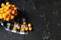 Yellow plums on the black background. Ingredients for a jam. Food photography. Yellow sunflower, Autumn Royalty Free Stock Photo