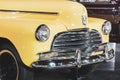 A yellow 1946 Plymouth Custom Suburban an American Classic Antique Car Royalty Free Stock Photo