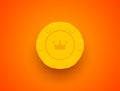 Yellow poker chip glossy black jack poker club casino crown emblem isolated on orange background. Bright casino chip icon design.