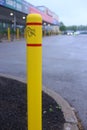 Yellow pole in public outside