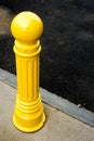 Yellow pole on the street