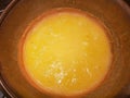 Yellow polenta cooked in copper cauldron. Typical food of northern Italy