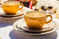 Yellow Polka Dot Teacup on White Tablecloth Tablewear Cafe Drink Royalty Free Stock Photo