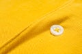 Yellow polo shirt texture, cotton fabric. Textile background Royalty Free Stock Photo