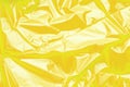 Yellow polyethylene texture. Background exhaust cellophane package