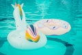 Yellow pool float, pool ring in cool blue refreshing blue pool Royalty Free Stock Photo