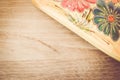 yellow porcelain tablemat on a pastel green wood surface