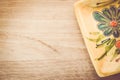 yellow porcelain tablemat on a pastel green wood surface