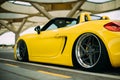 Yellow Porsche Boxster on the road