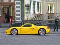 June 12, 2011, Kiev - Ukraine. Yellow Porsche Carrera GT in the center of Kiev