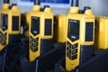 Yellow portable two way GMDSS VHF radio using on the ship during emergency safety Royalty Free Stock Photo