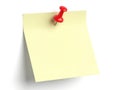 Yellow post-it note with red pushpin isolated on white background Royalty Free Stock Photo