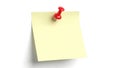 Yellow post-it note with red pushpin isolated on white background Royalty Free Stock Photo