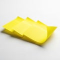 Yellow post-it notes stacked on white background Royalty Free Stock Photo