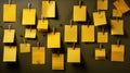 Yellow post-it notes on a wall. Shallow depth of field. Royalty Free Stock Photo