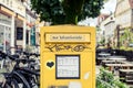 A postbox has been covered with a sticker that says \