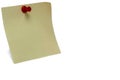 yellow postit note red pin white background Royalty Free Stock Photo