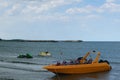 Yellow power sport tourist boat, jet skis at the Black Sea