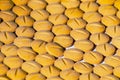 Yellow prescription pills spilled onto a table. Background for opioid addiction concept and the pharmaceutical industry Royalty Free Stock Photo