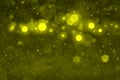 yellow nice shining glitter lights defocused bokeh abstract background with falling snow flakes fly, festival mockup texture with
