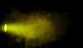 Yellow projector. Spotlight stage with smoke. Isolated background texture