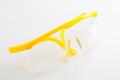 Yellow protective spectacles isolated on white background Royalty Free Stock Photo