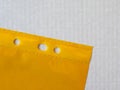 Yellow punched pocket Royalty Free Stock Photo