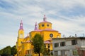 Yellow and purple church of Castro, Chiloe, Chile Royalty Free Stock Photo