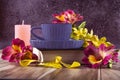 Yellow and purple flowers of alstroemeria, blue cup of coffee. Romantic composition with candles and a book. Royalty Free Stock Photo