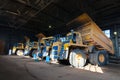 Quarry dump trucks in service zone Royalty Free Stock Photo