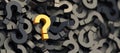 Yellow question mark on a background of black signs Royalty Free Stock Photo