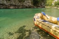 Yellow raft on a mountain riverbank Royalty Free Stock Photo