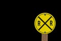 Yellow railroad crossing sign