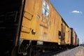 Yellow railroad freight cars