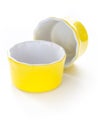 Yellow ramekins on white background. Royalty Free Stock Photo