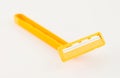 A yellow razor on white Royalty Free Stock Photo