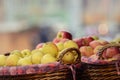 Yellow and red apples in wooden baskets. Royalty Free Stock Photo