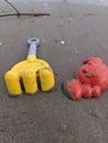 Yellow and red beach toys object Royalty Free Stock Photo